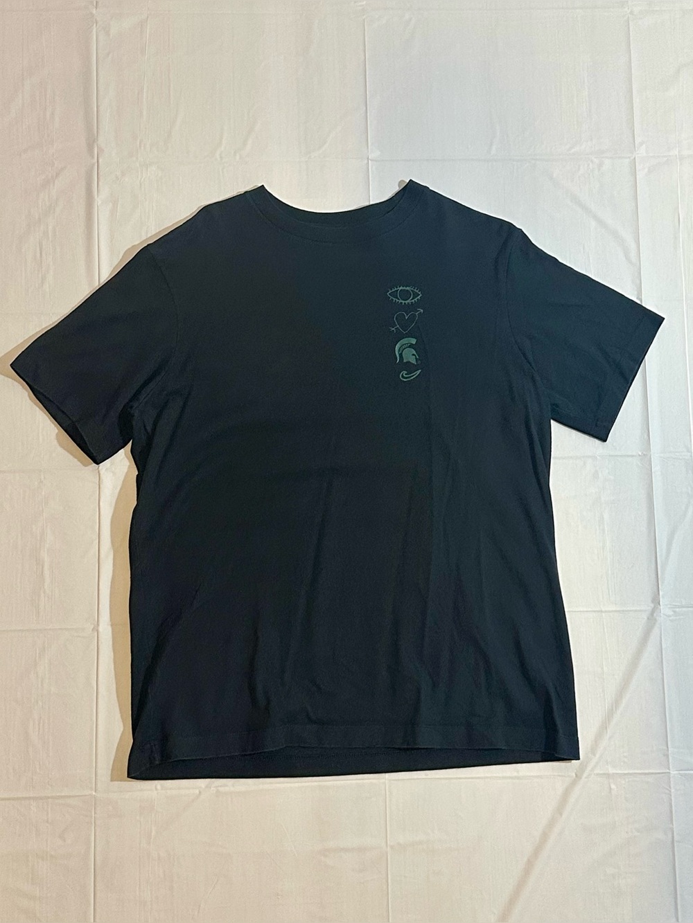 Nike Black Short Sleeve Crew Tee with Small Green Chest Graphic